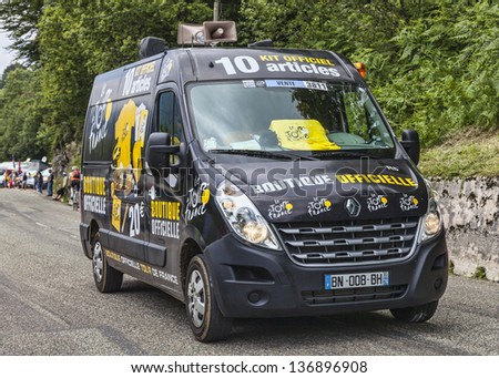 GOURETTE,FRANCE-JUL15:The van of mobile Official Shop of Le Tour de France on the road to mountain pass Aubisque,before the appearance of the cyclists in the 13 stage of Tour of France on July 15 2011