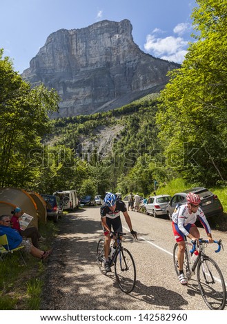 LA PALUD,FRANCE,JUL 13:Amateur cyclists climbing the road to mountain pass Granier in the Alps before the passing of the peloton in the 12 stage of the Le Tour de France on July 13 2012 in La Palud