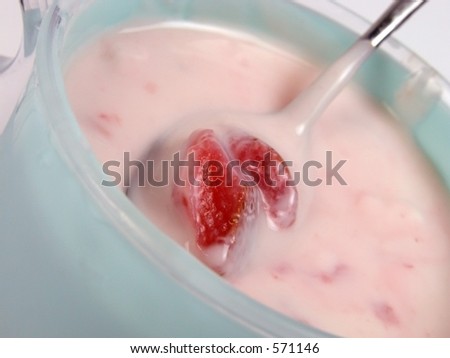 Close-up of a strawberry yogurt cup