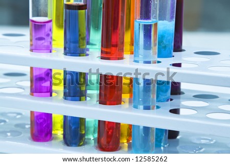 Colorful image of a test tubes stand; unmodified specific lighting for a laboratory.