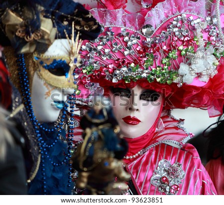 VENICE, ITALY-FEBRUARY 26:Unidentified people in Venetian masks at St. Mark\'s Square participate in the Carnival of Venice on February 15, 2010. In 2012 the Carnival will be between 11- 21 February.