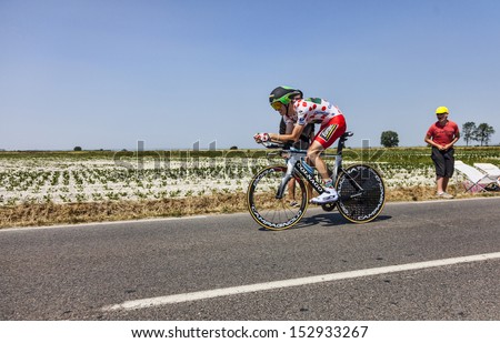 LE PONT LANDAIS,FRANCE-JUL 10: The Polka Dot Jersey ( Pierre Rolland, France) cycling during the stage 11 (time trial Avranches -Mont Saint Michel) of Le Tour de France on July 10, 2013