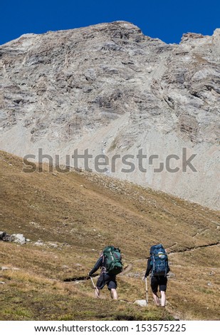 COL DE LA CAYOLLE, FRANCE-AUG 26:Unidentified people hiking in The South Alps in France close to mountain pass Cayolle on August 26, 2012. Summer hiking in mountains is very popular in France