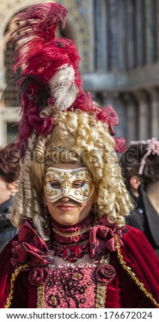 VENICE-FEB 18:Environmental portrait of a woman with an eye mask (Colombina) and a sophisticated disguise on February 18,2012 in Venice.In 2014 the Venice Carnival will be between February 15-March 4