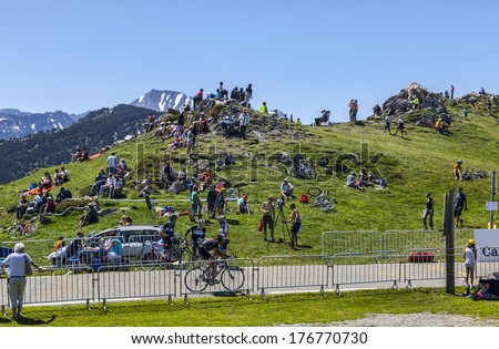 PORT DE PAILHERES,FRANCE- JUL 6:Cycling fans waiting for the peloton many hours before the race on the Col de Pailheres in Pyrenees Mountain during stage 8 of Le Tour de France on July 6 2013