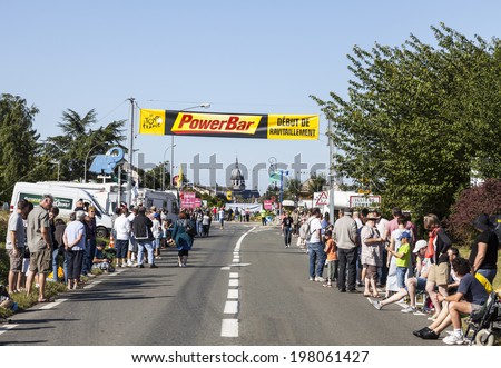 ILLIERS-COMBRAY,FRANCE,JUL 21: Spectators waiting for the peloton on the roadside in a rural area during the 19th stage of Le Tour de France on July 21 2012