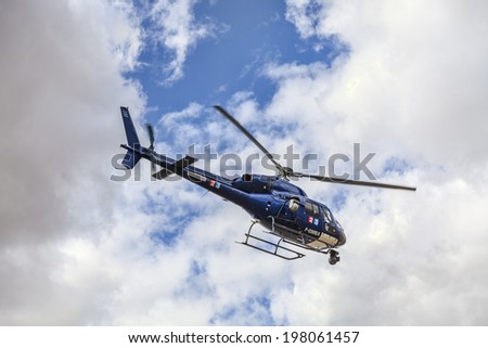 ILLIERS-COMBRAY,FRANCE,JUL 21:Image of a helicopter of France Television broadcasting live images during the 19th stage of Le Tour de France on July 21 2012