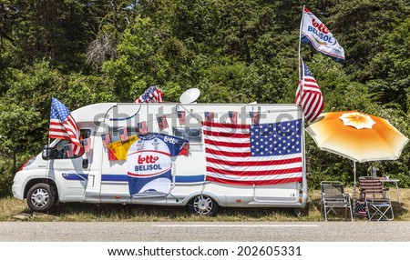 LA ROCHETTE, FRANCE- JUL 16:Image of a camping car of a fan of Le Tour de France, specific decorated,on a plain road in The Alps during the stage 16 of Le Tour de France on July 16 2013 in La Rochette