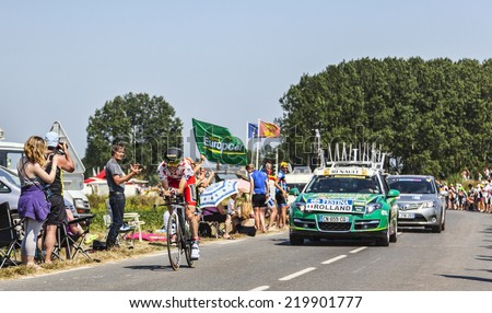 LE PONT LANDAIS,FRANCE-JUL 10:The Polka Dot Jersey ( Pierre Rolland, France) cycling during the stage 11(time trial Avranches -Mont Saint Michel) of Le Tour de France on July 10, 2013