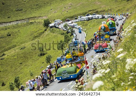 COL DE PEYRESOURDE,FRANCE- JUL 23:Teisseire caravan on the road to Col de Peyresourde in Pyrenees Mountains during the passing of the Publicity Caravan - stage 17 of Le Tour de France on 23 July 2014.
