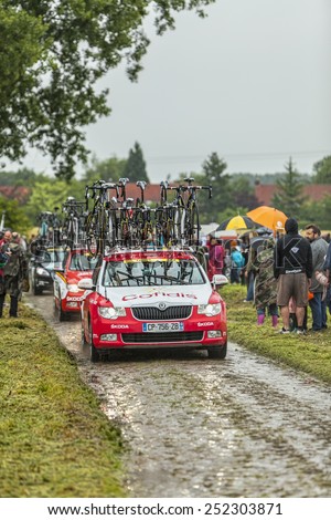 ENNEVELIN, FRANCE - JUL 09: The technical car of the Team Cofidis driving on the cobble-stoned road from Ennevelin, during the stage 5 of Le Tour de France in Ennevelin on July 09 2014.