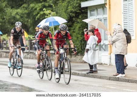 GERARDMER,FRANCE - JUL 12: Three cyclists, Peter Velits and Amael Moinard (BMC Team),Ben Gastauer(Ag2r-La Mondiale Team) ride during the stage 8 of Le Tour de France on July 12, 2014 in Gerardmer