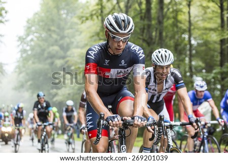 COL DU PLATZERWASEL, FRANCE - JUL 14:The cyclist Sebastien Reichenbach of IAM Cycling Team, climbing the mountain pass Platzerwasel during the stage 10 of Le Tour de France on July 14 2014