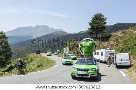 COL D'ASPIN,FRANCE - JUL 15: Skoda Caravan during the passing of the Publicity Caravan on a Col d'Aspin in Pyerenees Mountains during the stage 11 of Le Tour de France on Juy 15, 2015.
