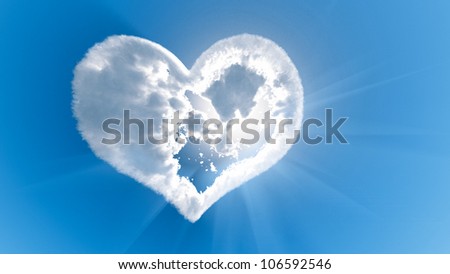 Heart shaped cloud with sun rays