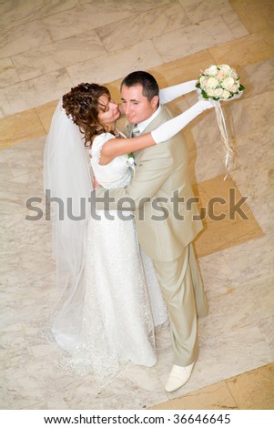 Bride and groom dancing. Top view shot