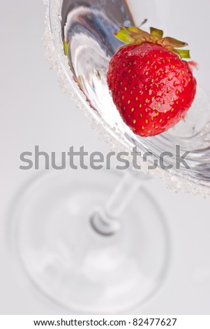 Martini glass with strawberry cocktail