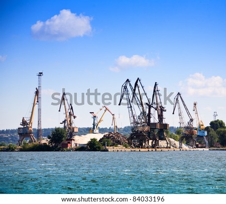 Heavy machinery in river port