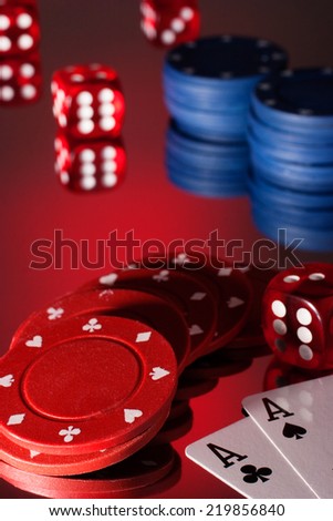 Poker dices, dice and two aces with reflection