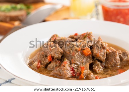 Beef goulash,  stew of meat, and vegetables, seasoned with paprika and other spices