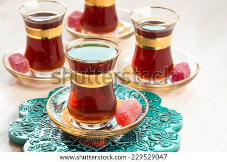 Very taste black Turkish tea drinking, traditional Turkish tea in glasses
