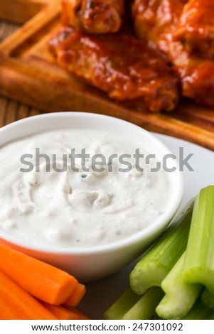 Blue cheese dressing, popular dip with buffalo wings and raw vegetables