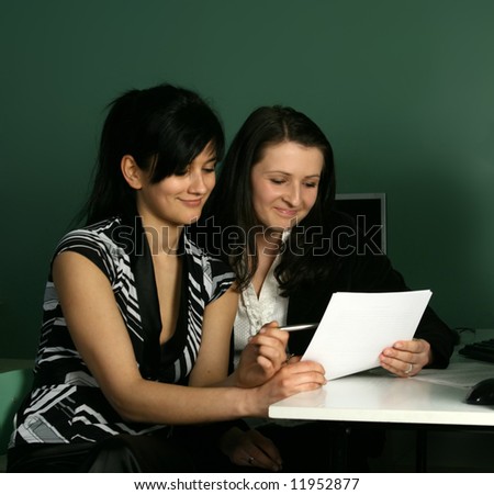 Two girls at the computer