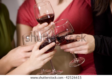 Toasting,  women drinking red wine