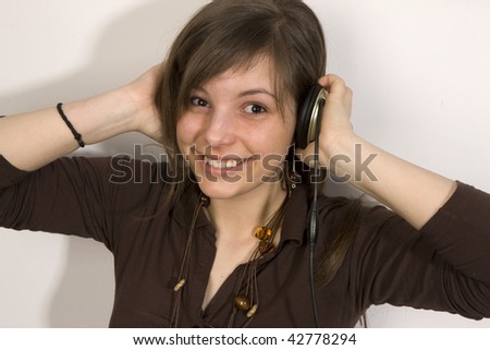 Relaxed young woman listening music