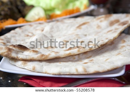 freshly made naan bread at an Indian restaurant