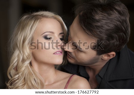 Portrait of kissing couple