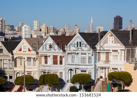 The Downtown area of San Francisco from Alamo Square Park at sunset. In California, USA