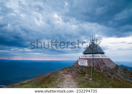 View of Mt Buller summit hut at sunset in Victoria, Australia