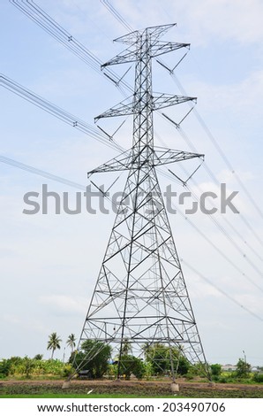 Electric Transmission Tower in Paddy or rice field at Thailand