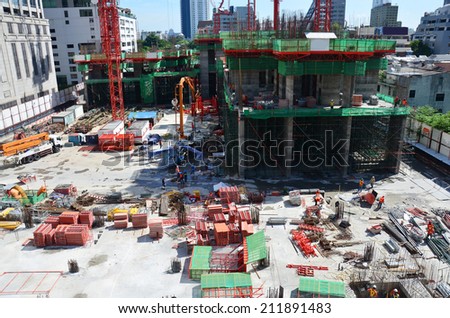 People working on Building Business Construction Site at Bangkok Thailand