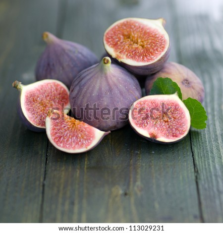 Fresh figs on wooden ground Fresh figs on wooden ground
