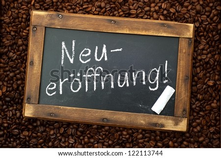 Chalkboard with german text: New opening