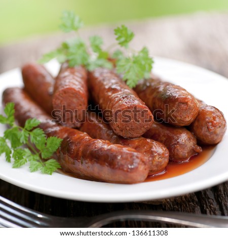 Frying sausage with lamb