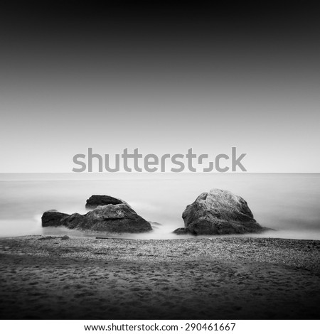 Black coast. Beautiful daytime long exposure photo of beach taken in black and white. Black sea, Odessa, Ukraine