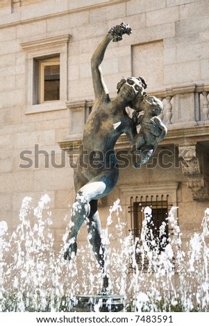 A festive fountain decorates an Italian plaza in portrait orientation