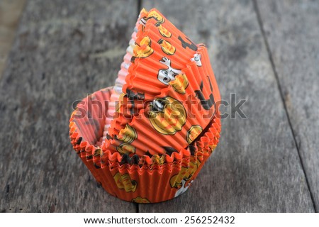 Cup cake cups with Halloween theme orange color.Selective focus, soft focus and shallow depth of fields