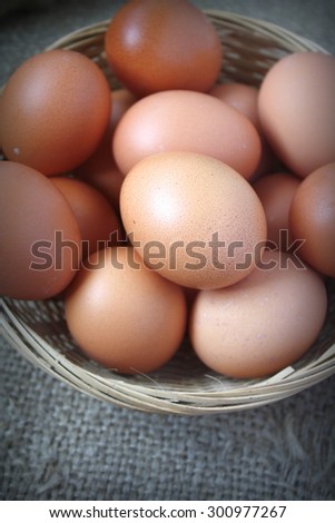 Fresh eggs with brown sack background. Country living concept