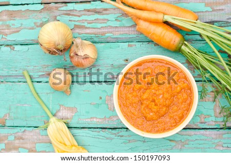 Squash caviar with carrot and onion top view