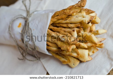 crispy sticks with caraway seeds, cheese and onions