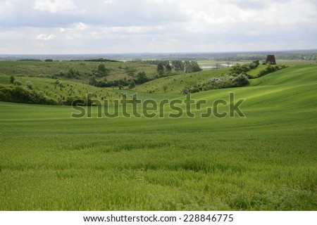 Classic Polish countryside, fields, meadows, lakes, hills, ponds, windmills.