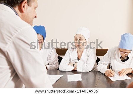 Doctor listening speaker at the doctors meeting