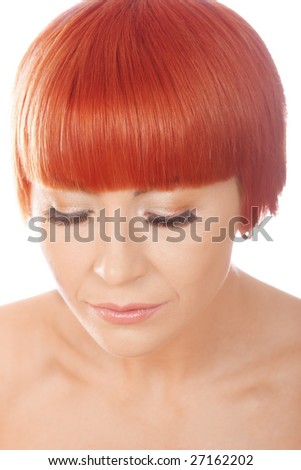 Redhead woman with closed eyes over white background