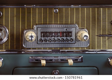 Car radio in retro automobile closeup photo