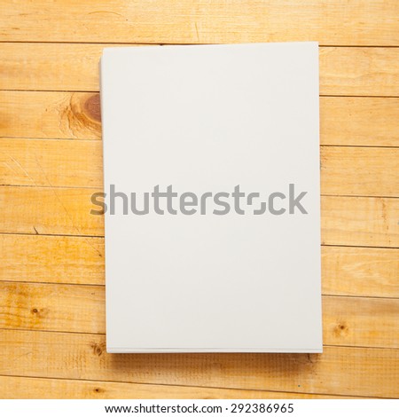 blank forms on a wooden background.