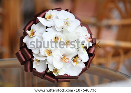 Bouquet of fresh flowers for wedding ceremony. Bridal bouquet from orchids